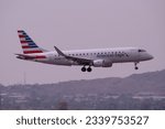 Small photo of Phoenix Sky Harbor Airport 7-29-2023 Phoenix, AZ American Eagle Airlines Embraer ERJ-175 N251NN Operated by Envoy Air on final 25L at Sky Harbor International
