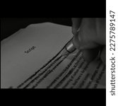 Small photo of strikethrough on text of script in black and with shallow depth of field and selective focus