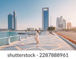 Small photo of Strolling along the Abu Dhabi Corniche, a scenic waterfront promenade with stunning views of the Arabian Gulf and the city's iconic skyscrapers, is a must-do for any visitor to the UAE's capital.