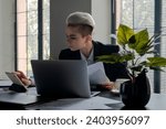 Small photo of Woman doing financial analysis using her tablet. Businesswoman hardworking to get promotion in office. Confident blonde hair lady browsing computer find current data on internet. Entrepreneur rewrite