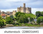 Small photo of View over the river Coquet to the medieval Warkworth Castle and the village of Warkworth in Northumberland, England.