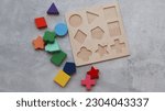 Wood puzzle with geometric...
