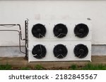 Condensing unit of air conditioning systems. Heat exchanger with fans for industrial fridge