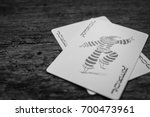 Joker card on wooden floor,Black and white pictures