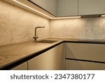 kitchen worktop with sink and faucet
