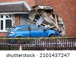 Small photo of Aylesbury,Bucks,UK - September 11th 2011. Car comes off the road and crashes into a house