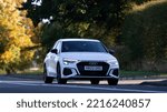 Small photo of Bicester,Oxon,UK - Oct 9th 2022. 2022 Audi A3 S LINE ED 1 35 TFSI MHEV SA travelling on an English country road