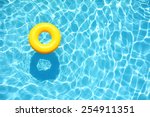 Yellow pool float  ring...