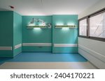 Vibrant empty hospital rooms with modern blue and grey flooring, radiating a calming yet professional atmosphere