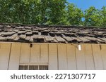 Small photo of San Juan Bautista, California, July 2016: Closeup on the wood shingles on the roof of Vicky's Cottage at the San Juan Bautista State Historic Park