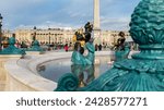 Small photo of Paris, France, Nov 13, 2023: A triton in the Maritime Fountain designed by Jacques Ignace Hittorff in 1840, with the Luxor Obelisk in the background