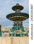 Small photo of Paris, France, Nov 13, 2023: The Maritime Fountain designed by Jacques Ignace Hittorff in 1840, with the Hotel de Crillon in the background (vertical)