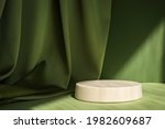 Abstract minimal scene with geometrical form. Cylinder podium on green background. Abstract background. Scene to show cosmetic podructs. Showcase, display case. 3d render.