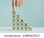 Small photo of Wooden block with tax deduction icon to achieve environmental goals Using environmental taxes, carbon taxes, tax benefits that are Environmental tax abatement concept