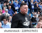 Small photo of Former footballer Geoff Horsfield makes a celebratory entrance onto the pitch at The Shay Stadium in Halifax, England, marking the 25th reunion of the 97 98 promotion side on April 15th, 2023.