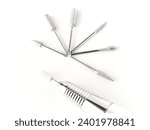 Electric nail drill for manicure and pedicure with bits on a white background 