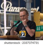 Small photo of Actor Brian Cranston speaks at Sag after a rally at Times Square in New York City on July 25, 2023
