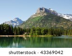 Summer view of upper waterton lake and mountains in goat haunt ranger station, glacier national park, montana, usa