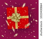 a realistic red gift box... | Shutterstock .eps vector #1023430864