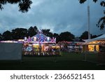 Small photo of Syston, Leicestershire, England, September 19th 2023, Billy Bates fun fair and amusement park, Central Park, taken at dusk