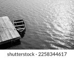 Rowboat Tied To Dock In Maine