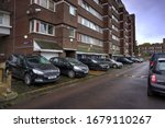 Small photo of Deptford, London, United Kingdom - October 12, 2019: Argosy House part of the Pepys social housing estate from rear showing parked cars.