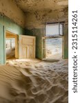 Abandoned house being taken over by  sand in the Kolmanskop ghost town near Luderitz, Namib Desert, Namibia.