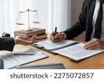 Small photo of Lawyers, lawyers, Asian businessmen are working together to clarify. Review and review business contracts or life insurance contracts for benefits or sign documents and get a loan start a business.