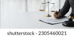 Small photo of copy space, banner, panorama Lawyer or legal counsel holding the hammer of justice Concluded in terms of contract documents Concept of Lawyer or Law Enforcement holding hammer as a judgment.