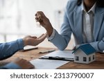 Small photo of agent, american businesswoman African giving keys to owner or tenant Customers after signing a house hire contract, broker, agreement, loan, mortgage, rent, buy, sell, insurance, real estate