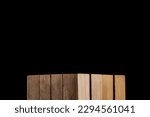 Small photo of Classic wooden box on a black background as an ideal base for displaying cosmetic, food and other products. caja de madera clasica en fondo negro como base ideal para exhibir productos