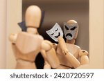 Small photo of Angry, dangerous mannequin puts on cute cheerful mask in front of mirror, concept of danger, hypocrisy, deception.