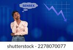 Small photo of Woman worried about SENSEX going down, shows she is sad about the crashing Indian stock market.