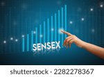 Small photo of Sensex Going Up with Finger pointing on the graph - Indian stock market concept.