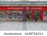 Small photo of Plymouth England January 2020. Entertainment Exchange. National chain of high street retailers of video games, mobile phones and cameras, buy outright or part exchange. Double shop frontage, signage.
