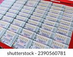 Small photo of SAMUTSONGKHRAM, THAILAND - NOVEMBER 17, 2023: Thai government lottery on stall for sale, the lottery is dawn on the 1st and 16th of every month