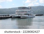 Small photo of Lake Towada sightseeing boat just arrived at the dock - Towada City, Aomori Pref Japan - June 21, 2022