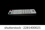 Small photo of BenQ projector remote control with black background