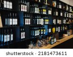Shelf With A Variety Of Bottles ...