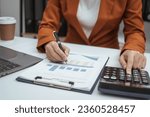Small photo of Close up hands of woman in brown formal suit checking bills, taxes, bank account balance, using calculator, Personal Checking, Empower Checking, Personal Savings, Certificates, IRAs, Money Market