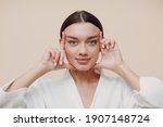 Small photo of Young woman doing face building facial gymnastics self massage and rejuvenating exercises