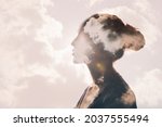 Psychology and woman mental health and weather dependent concept. Multiple exposure clouds and sun on female head silhouette.