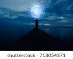Abstract science, circle global network connection in hands on night sky background / soft focus picture / Blue tone concept