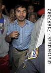 Small photo of LOS ANGELES - AUGUST 30TH: Boxer Manny Pacquiao is seen at LAX . August 30th 2010 in Los Angeles, California