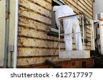 Small photo of Asbestos abatement (house facade)