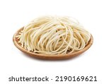 raw ramen noodle in wood plate isolated on white background. fresh egg ramen noodle isolated on white background. Japanese food ramen noodle isolated on white background                            