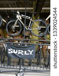 Small photo of MINNEAPOLIS, MINNESOTA / USA - AUGUST 16, 2016: Display of Surly bicycles at Freewheel bicycle shop located on the Midtown Greenway bicycle trail.