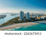 Small photo of wide drone shot of the port of miami florida during a bright sunny day. Miami Beach, wonderful aerial view of buildings, river and vegetation. Panorama view of Miami Beach, South Beach, Florida, USA.