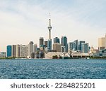 Small photo of Toronto, Ontario, Canada. May 27, 2013. Toronto, Canada, downtown financial, business district. View from lake Ontario. CN Tower.