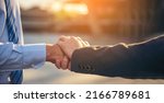 Small photo of Attorney promise Lawyer partnership Businessman handshake together law firm. Teamwork Two Men Trust honesty business handshake promise respect partner. Diversity Attorney team Partner hands together